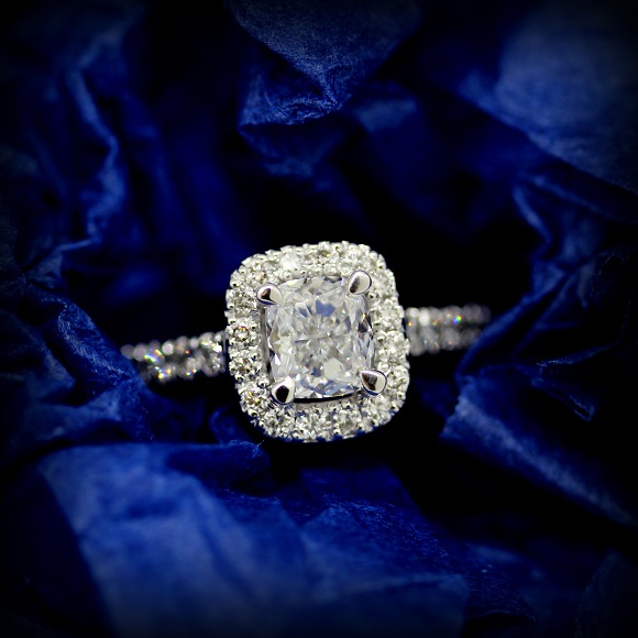 18ct White Gold Cushion Cut Diamond in a raised four calw setting with a halo of Round Brilliant Cut Diamonds.  Torres Jewel Co 2