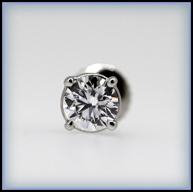 Platinum Round Brilliant Cut Diamond in a four claw setting. Hearts and Arrows Torres Jewel Co