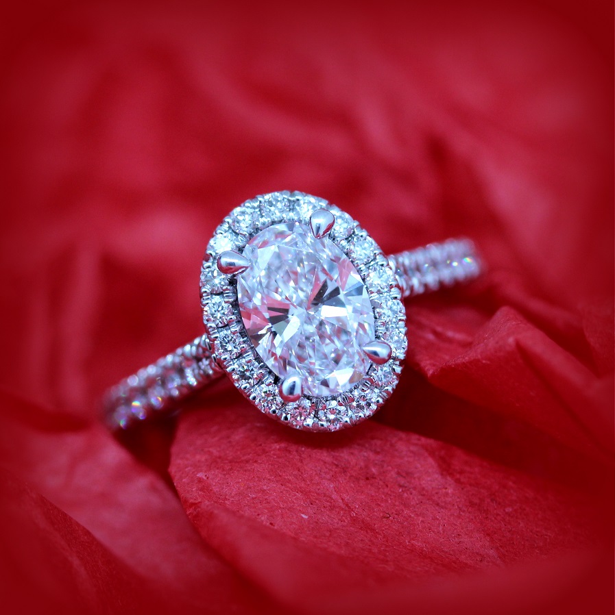 18ct White Gold Oval Cut Diamond ring with a Diamond halo and band Torres Jewel Co